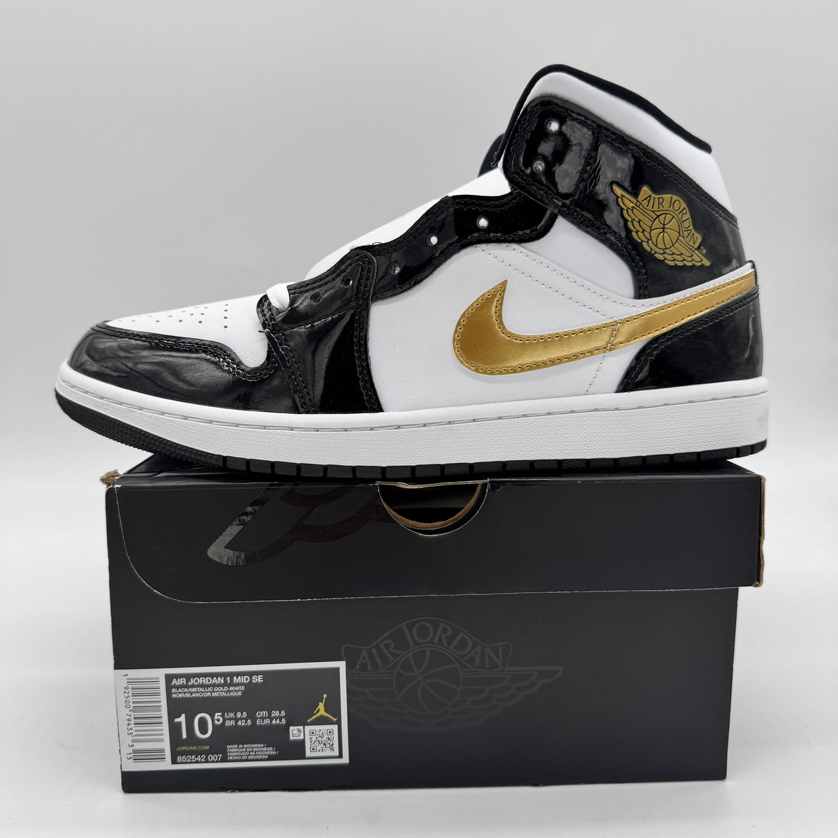 Jordan 1 Mid Patent Black White Gold