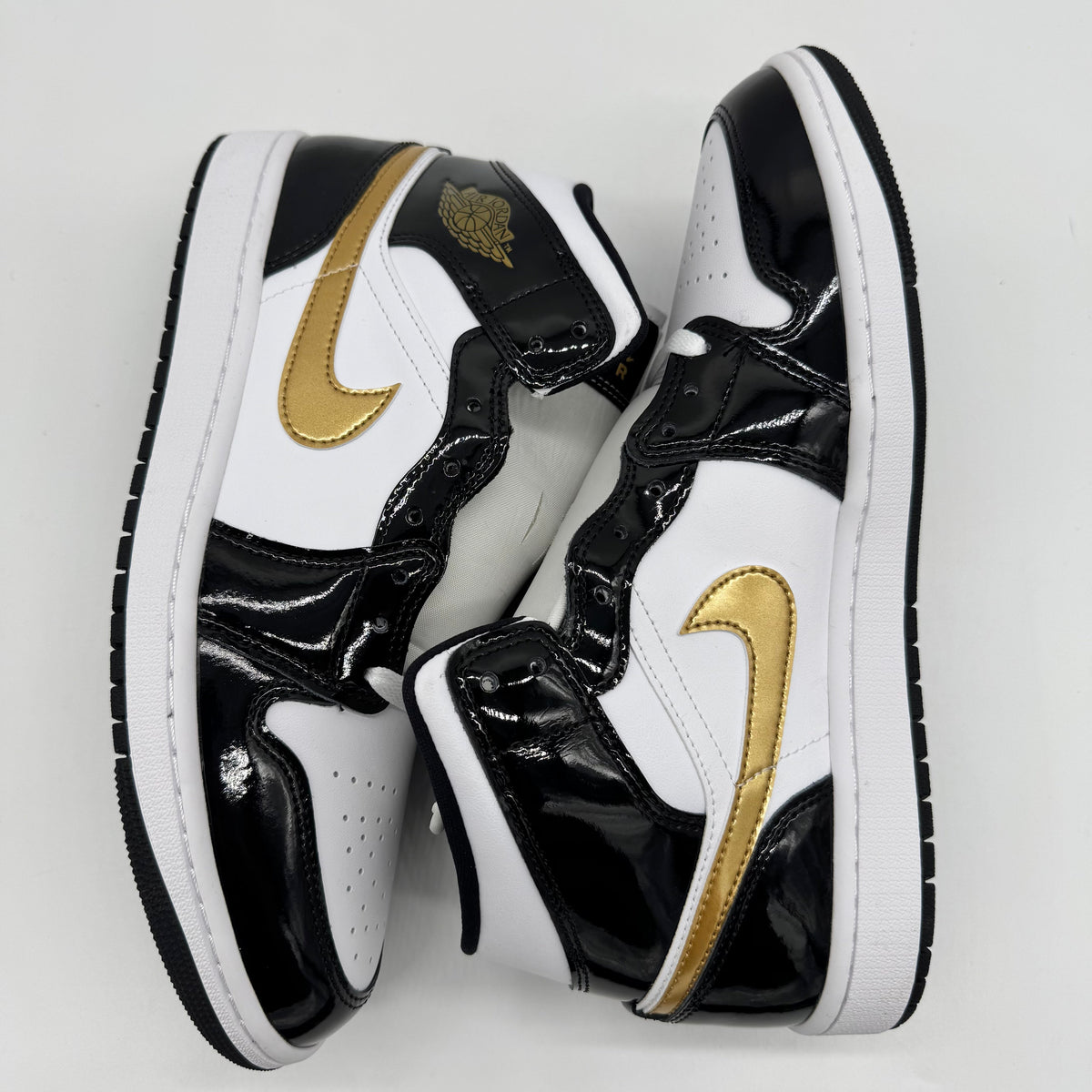 Jordan 1 Mid Patent Black White Gold