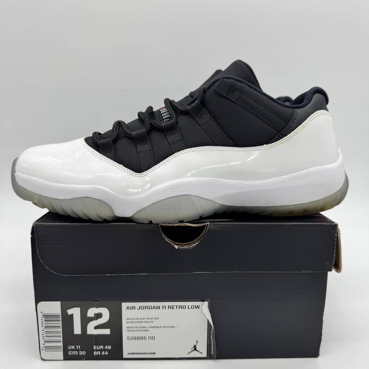 Jordan 11 Low Tuxedo
