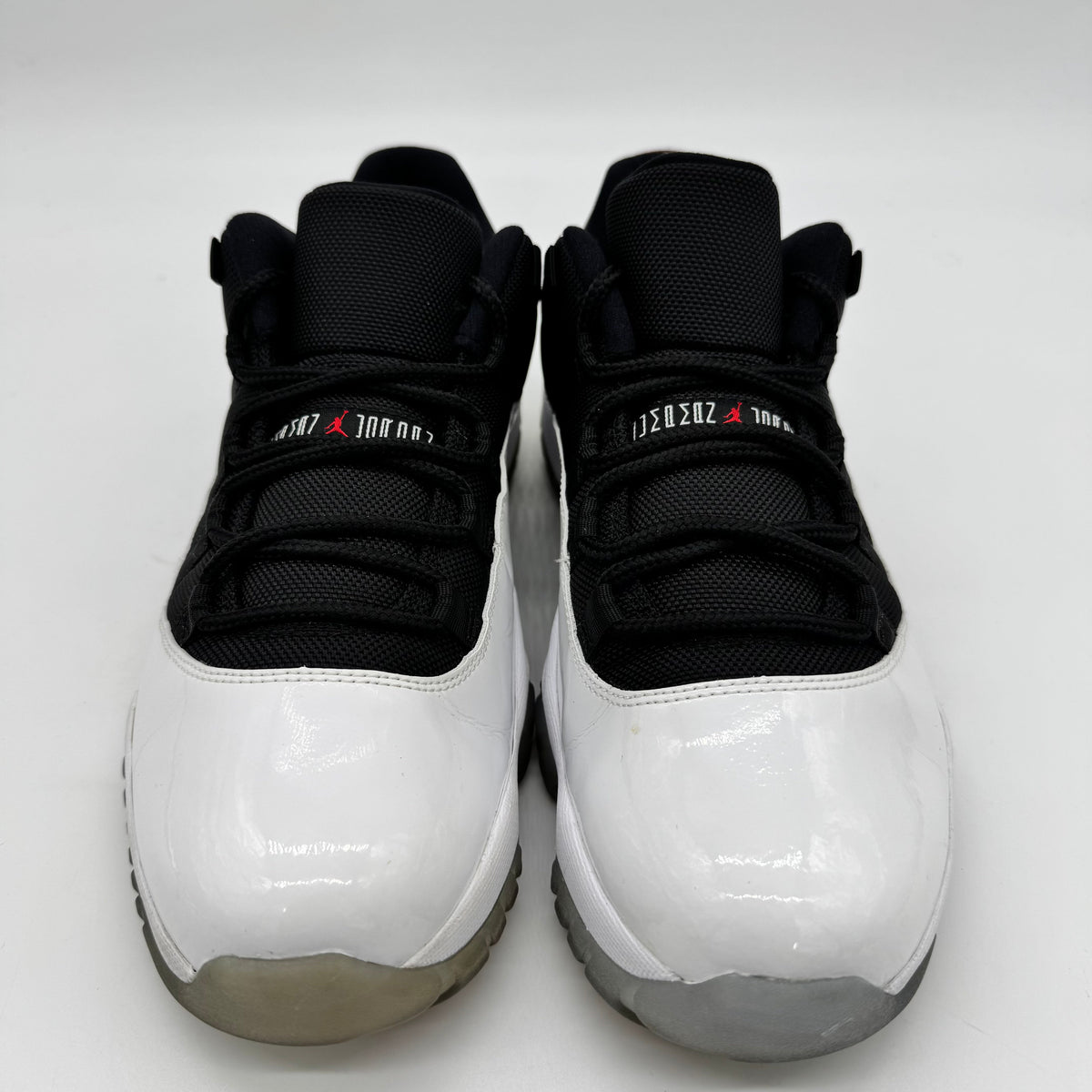 Jordan 11 Low Tuxedo
